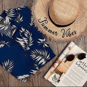SHEIN blue tropical print button down short sleeve top!
